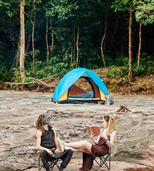 couple-camping-in-forest-B4LBWVJ.jpg